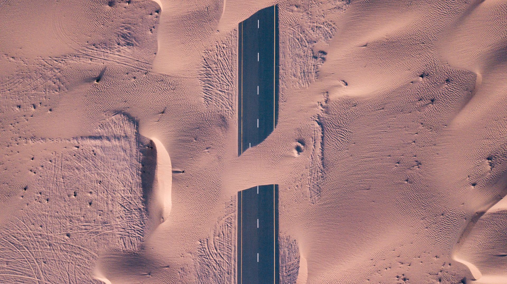 A road cutting through the desert, Saudi Arabia